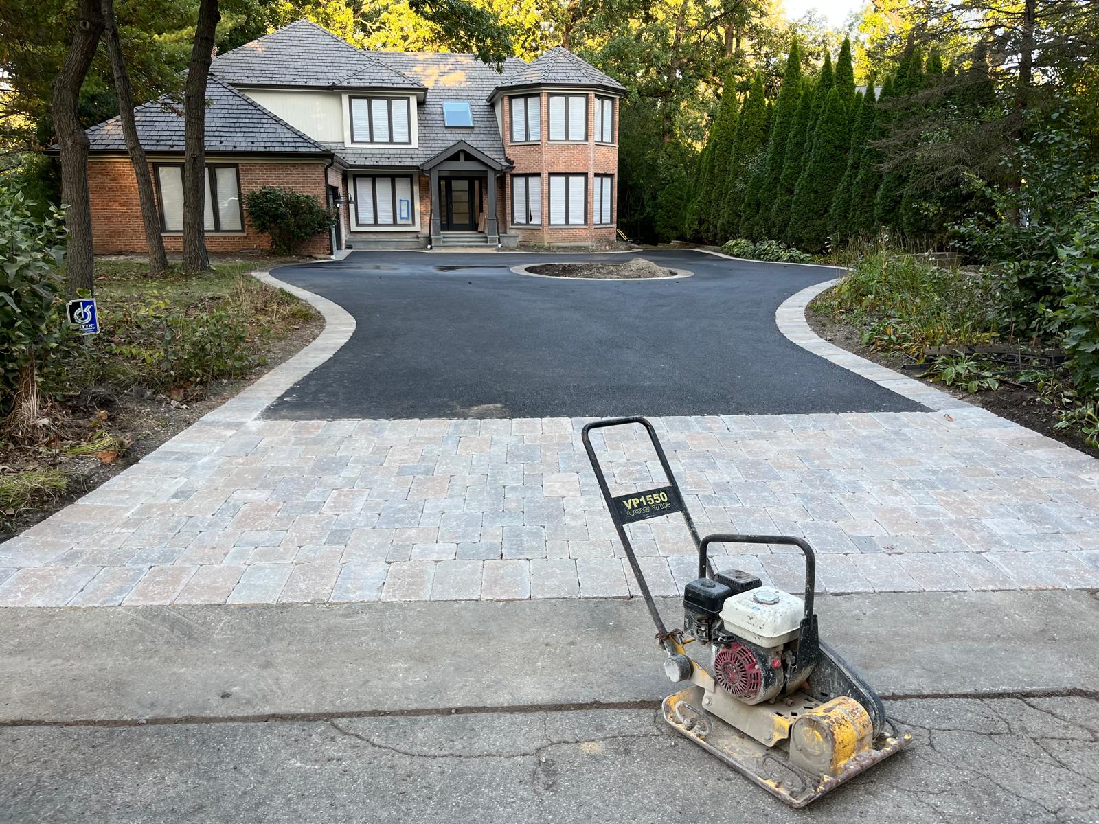 Concrete driveway with paver apron